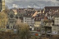 Cityscape of Berne old town and streets in the old medieval city of Bern with Swiss Alps on background