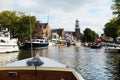 Cityscape, church and ships in Amsterdam