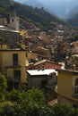 Cityscape of Cinque Terre village roofs with traditional houses coast with hazy sky