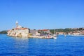 Cityscape of the city Rab, Croatia, seen from the water Royalty Free Stock Photo