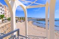 Cityscape of Civitavecchia in Italy: view of Pirgo beach with its pedestrian bridge. Royalty Free Stock Photo