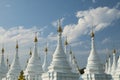 White Buddhist stupas in Sanda Muni Pagoda, Mandalay, Myanmar Royalty Free Stock Photo
