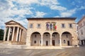 Cityscape with Communal Palace city hall and ancient Temple of Augustus in Pula. Istria, Croatia Royalty Free Stock Photo