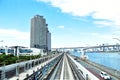 Picture inside a commuter train in Tokyo aproaching the end of Odaiba`s Rainbow bridge. Royalty Free Stock Photo