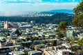 Cityscape of downtown historic districts of san francisco california in midday sun with distant fog on mountains Royalty Free Stock Photo