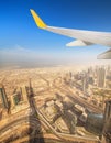 Cityscape of Dubai from aeroplane window Royalty Free Stock Photo