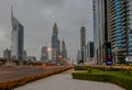 Cityscape of Dubai from Sheikh Zayed Road in a beautiful and full of lights sunrise.