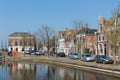 Cityscape Dutch village Makkum with historic houses along a canal Royalty Free Stock Photo