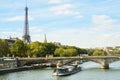 Cityscape with Eiffel tower, cruise boat, buildings, bridge