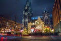 Cityscape - evening view of the Christmas Market on background the Cologne Cathedral