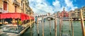 Cityscape with Grand Canal and Rialto Bridge at sunny day in Venice. Italy Royalty Free Stock Photo