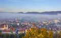 Cityscape of Graz with Mariahilfer church and historic buildings, in Graz, Styria region, Austria, in autumn, at sunrise