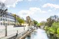 Cityscape of Hannover City with a river and buildings and green trees in April in Germany