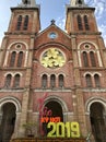 Cityscape of Ho Chi Minh City. Notre-Dame Cathedral Basilica of Saigon in the downtown. Close up of the gothic facade of the