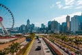 Cityscape of HongKong Island, Central district with skyline and Ferris wheel near Victoria Harbour