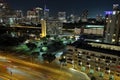 Cityscape of illuminated streets and buildings of Austin at night in Texas