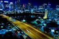 Cityscape of illuminated streets and buildings of Austin at night in Texas