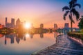 Cityscape image of Benchakitti Park at sunset in Bangkok Royalty Free Stock Photo