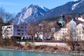 Cityscape of Innsbruck city center with beautiful houses, river Inn and Tyrolean Alps, Austria, Europe Royalty Free Stock Photo