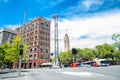 Cityscape at intersection formed by the Pitt Street and George Street with historic clock tower of Central Railway station.