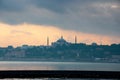 Cityscape of Istanbul at the evening, seaside view with silhouettes of mosques in old town. Istanbul skyline