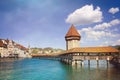 Cityscape of Lucerne with famous Chapel Bridge and lake Lucerne, Switzerland. Retro filter