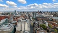 Cityscape of Manchester against the cloudy blue sky. England, UK. Royalty Free Stock Photo