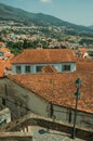 Cityscape with many rooftops and hilly landscape Royalty Free Stock Photo