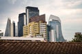 Cityscape of modern architecture buildings over moody sky in dow Royalty Free Stock Photo