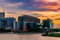 Cityscape of modern building near the river in the morning at sunrise . Modern architecture office building in Thailand. Royalty Free Stock Photo