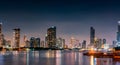 Cityscape of modern building near the river in the night. Modern architecture office building. Skyscraper with evening sky. Royalty Free Stock Photo