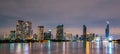 Cityscape of modern building near the river in the night. Modern architecture office building. Skyscraper with evening sky. Royalty Free Stock Photo