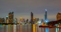 Cityscape of modern building near the river in the night. Modern architecture office building. Skyscraper with evening sky. Royalty Free Stock Photo