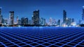 Cityscape of modern building at night with blue empty floor in front of building. Modern architecture office building. Skyscraper