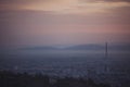 Cityscape in morning light and morning fog. Royalty Free Stock Photo