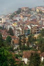 Cityscape on the mountain with fog, trees and mountain thar view from above in summer in Sa Pa, Vietnam Royalty Free Stock Photo