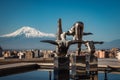 Cityscape with mountain view in the morning time concept photo. Modern art - stainless steel sculptures