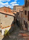 Cityscape with Narrow street in old historic alley in the medieval village of Anghiari near city of Arezzo in Tuscany, Italy Royalty Free Stock Photo