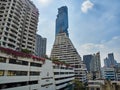 Cityscape and new office buildings near Silom on the background of the old slums of Bangkok