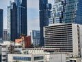 Cityscape and new office buildings near Silom on the background of the old slums of Bangkok