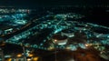 cityscape night scene shot oil storage tank and oil refinery factory zone, global business and industry about natural resources Royalty Free Stock Photo