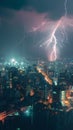 Cityscape at night with two lightning strikes creating dramatic scenery Royalty Free Stock Photo