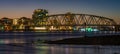 Cityscape of Nijmegen at night, view of the Snelbinder bridge and the waterfront of the river Waal