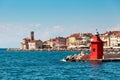 Cityscape of the old city Piran with medieval and new lighthouses