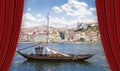 Cityscape of Oporto - Portugal with the traditional old portuguese wooden boats called barcos rabelos