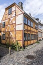 Orange traditional wattle house on crossroads, Helsingor, Denmark Royalty Free Stock Photo