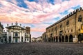 Cityscape panorama in Mantua Sordello square at cloudy sunset, Italy