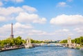 Cityscape of the river Seine in Paris, France, with the pont Alexandre III and the Eiffel tower by a sunny day Royalty Free Stock Photo