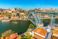 Cityscape of Porto. View of the Dom Luis I Bridge Ponte de Dom LuÃÂ­s I and the River Douro. View from Vila Nova De Gaia, Portugal Royalty Free Stock Photo