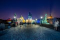 Cityscape of Prague with medieval towers and colorful buildings at night. Royalty Free Stock Photo